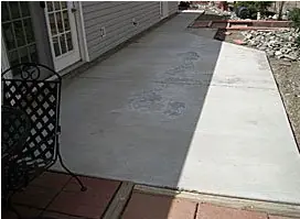 Grey broom-finished concrete walkway
